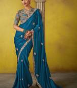 Teal pure based fancy fabric embroidery saree