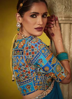 Teal pure based fancy fabric embroidery saree 3