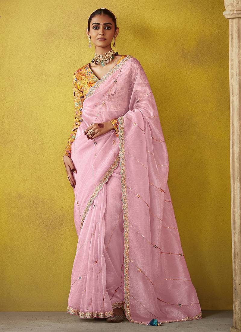 Baby pink pure based fancy fabric embroidery saree