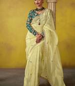 Cream pure based fancy fabric embroidery saree