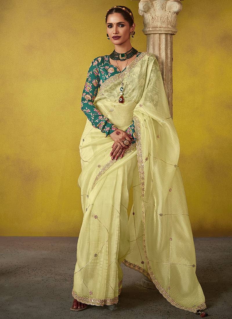 Cream pure based fancy fabric embroidery saree