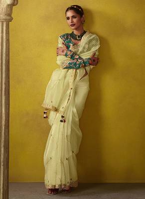 Cream pure based fancy fabric embroidery saree 3