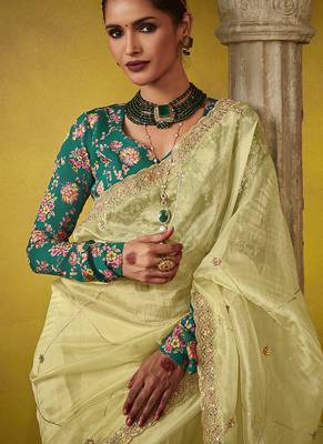 Cream pure based fancy fabric embroidery saree 5