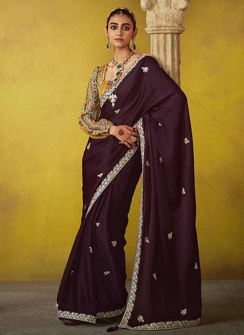 Wine pure based fancy fabric embroidery saree