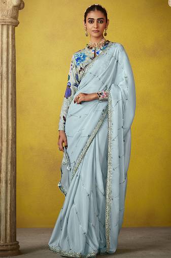 Sky blue pure based fancy fabric embroidery saree
