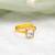 Gold plated grey stone ring