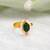 Gold plated emerald green kundan flower ring