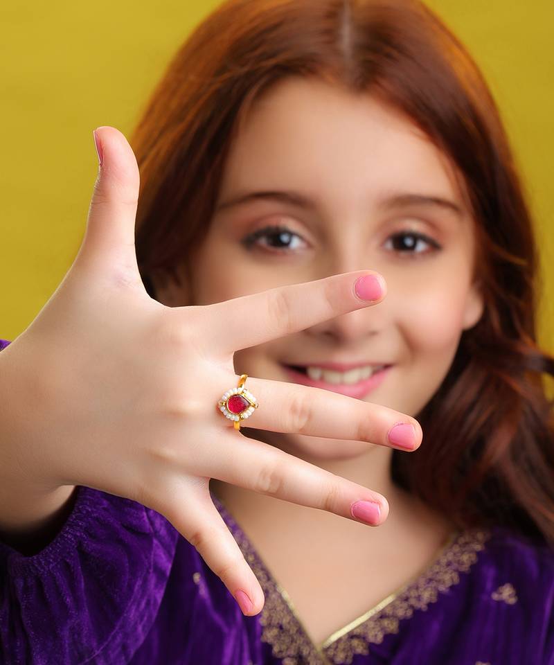 Gold plated ruby red pearl ring