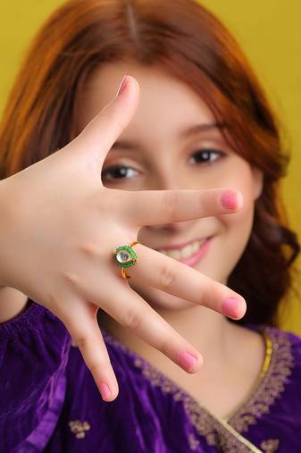 Gold plated kundan emerald green flower ring