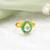 Gold plated kundan emerald green flower ring