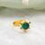 Gold plated emerald green kundan round ring