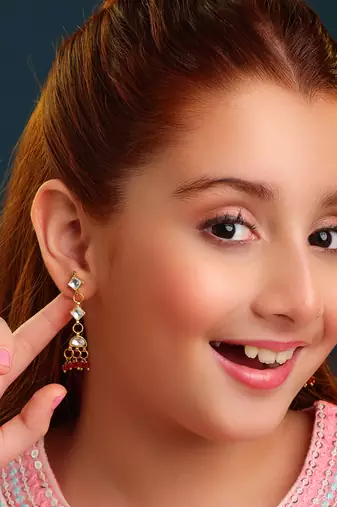 Gold plated kundan maroon drop earrings