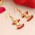 Gold plated pearl ruby red chandelier earrings