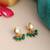 Gold plated kundan emerald green stud earrings
