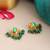 Gold plated emerald green kundan cluster earrings