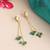 Gold plated kundan emerald green chain earrings