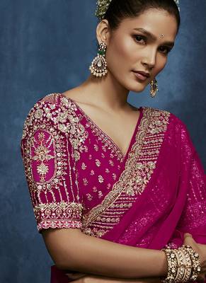 rani pink pure based fancy fabric embroidery saree 2