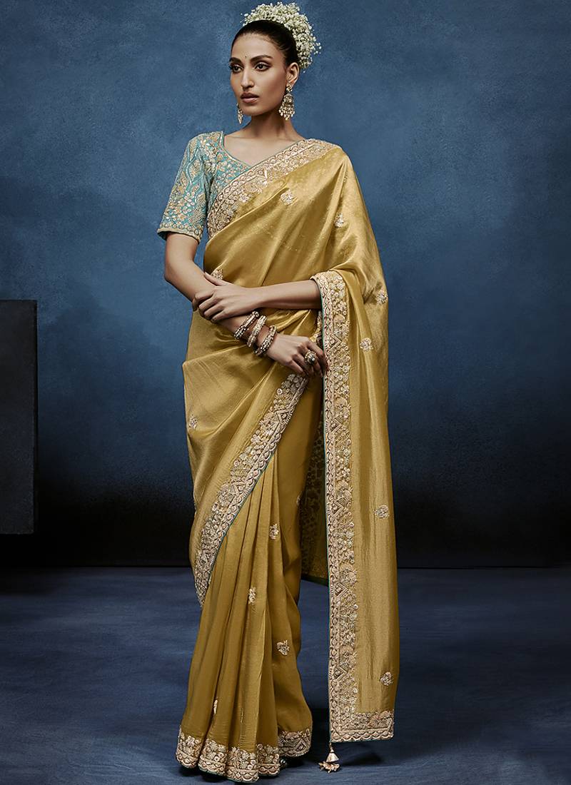 mustard pure based fancy fabric embroidery saree