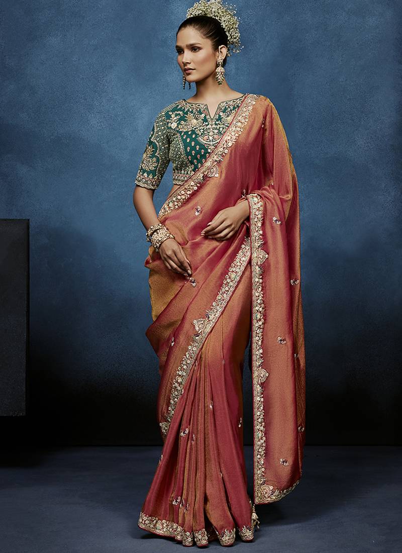 peach pure based fancy fabric embroidery saree