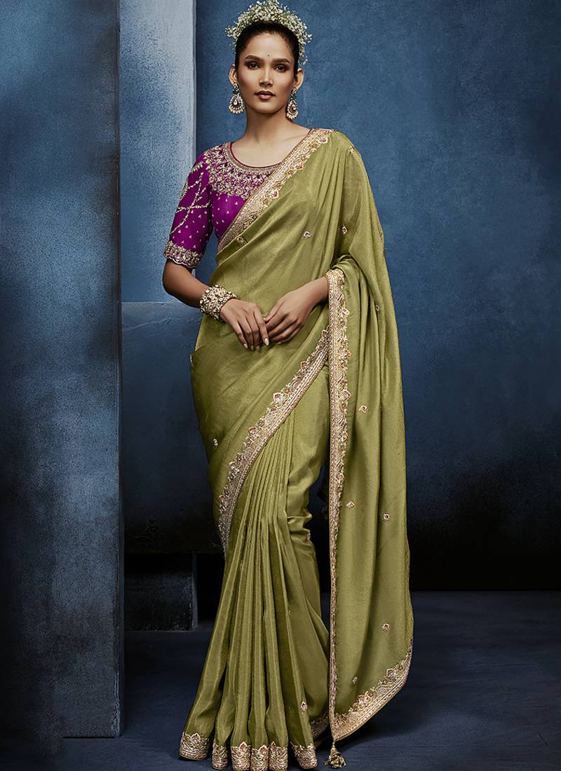 olive pure based fancy fabric embroidery saree