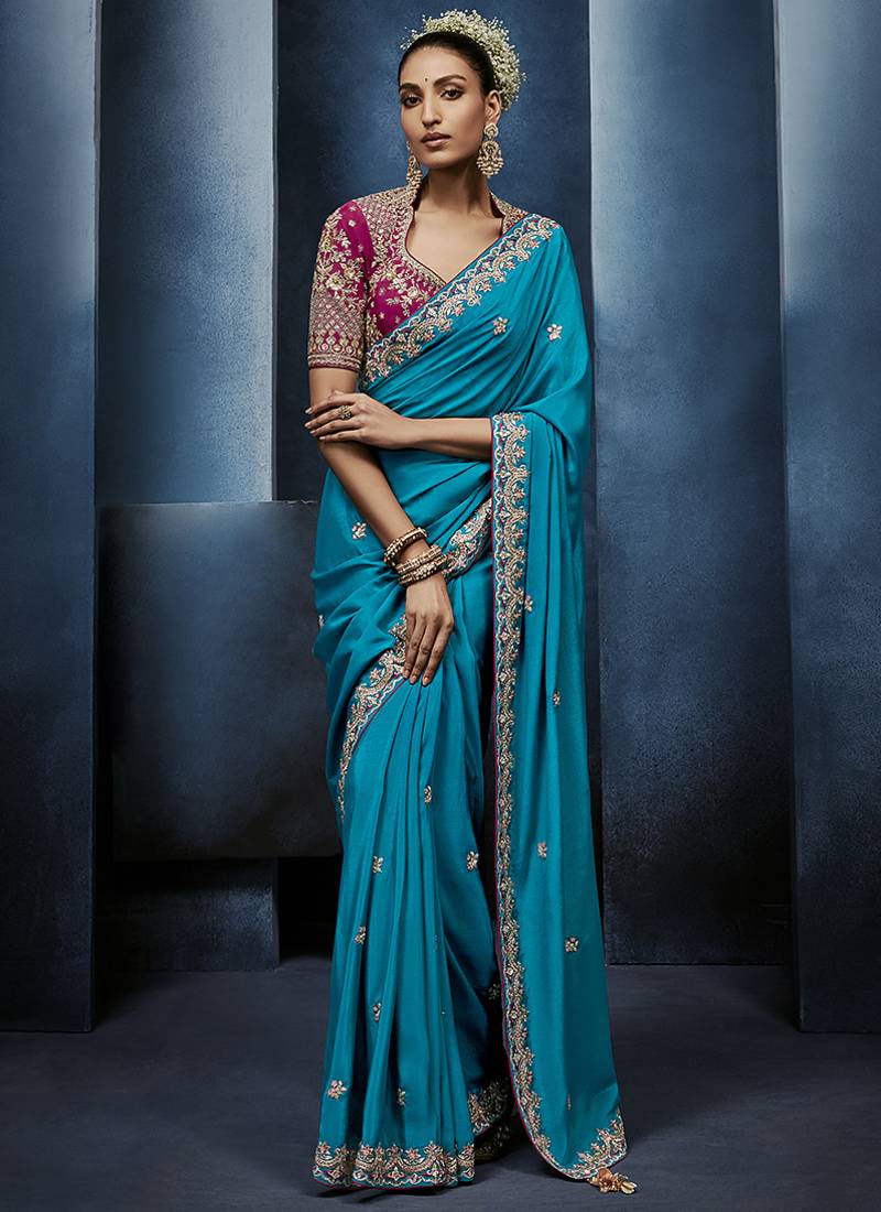 sky blue pure based fancy fabric embroidery saree
