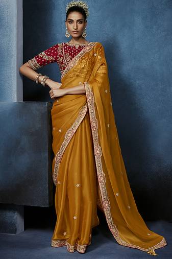 orange pure based fancy fabric embroidery saree