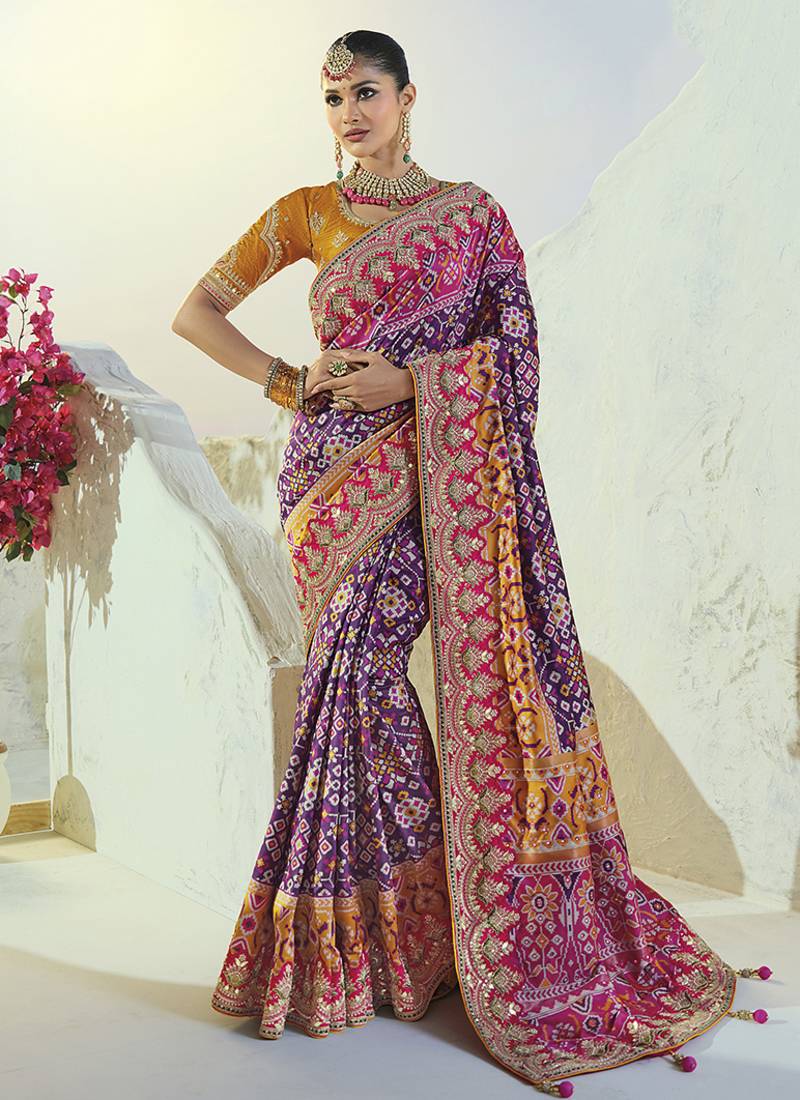 purple pure patan patola silk blend saree in heavy hand work mirror cut dana & moti design