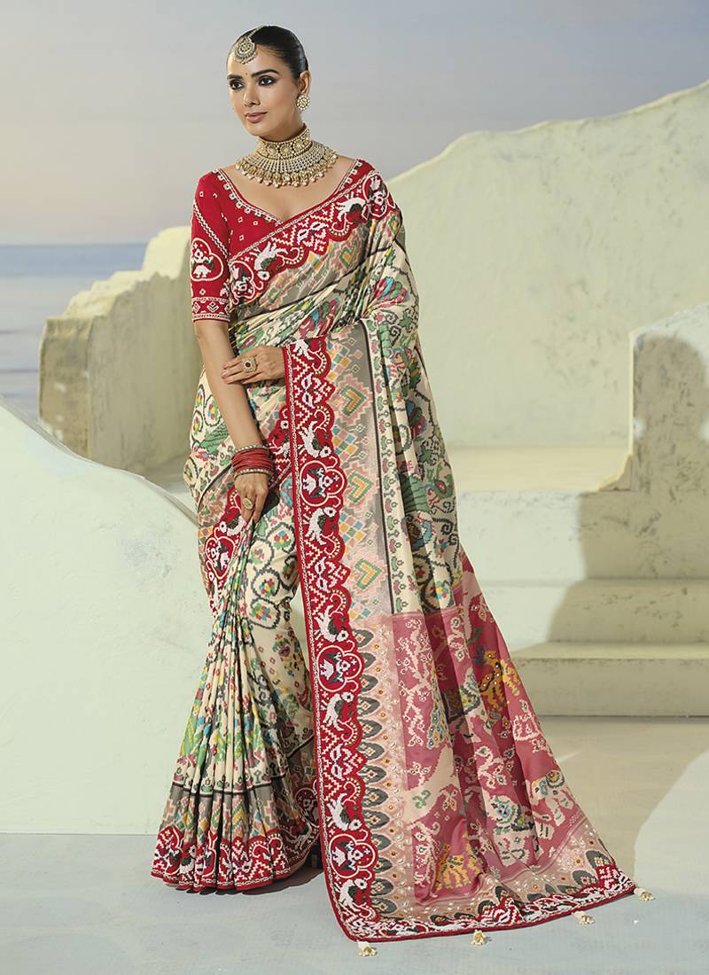 cream pure patan patola silk blend embroidery saree