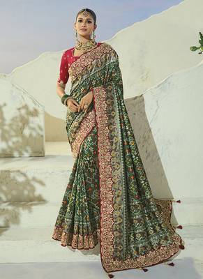 green pure patan patola silk blend saree with heavy handwork 1