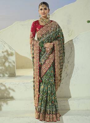 green pure patan patola silk blend saree with heavy handwork 2