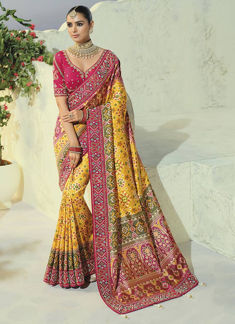 yellow pure patan patola silk blend saree with heavy hand work