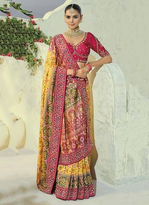yellow pure patan patola silk blend saree with heavy hand work 2