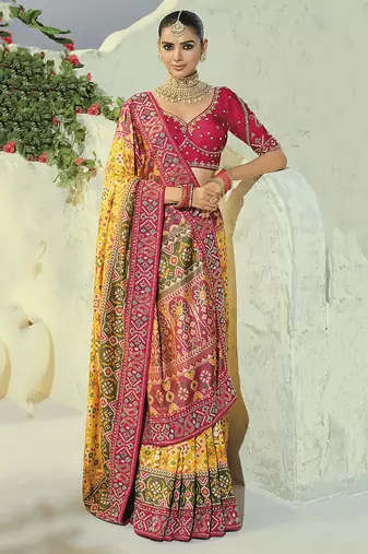 yellow pure patan patola silk blend saree with heavy hand work