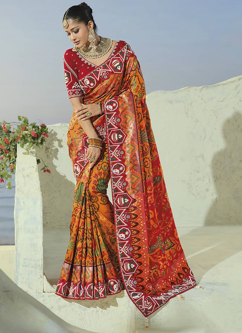 orange pure patan patola silk blend saree cream moti & beads heavy handwork