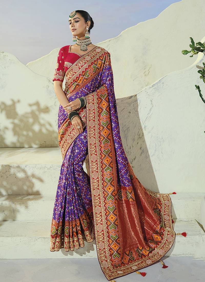 purple pure patan patola silk blend saree with heavy handwork