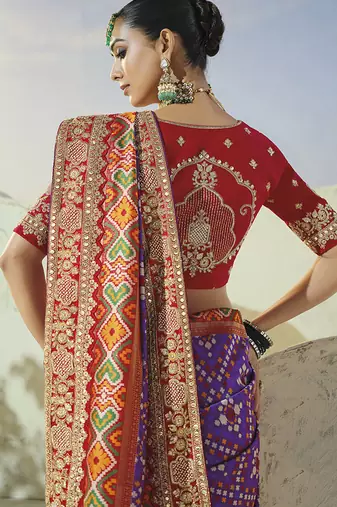 purple pure patan patola silk blend saree with heavy handwork