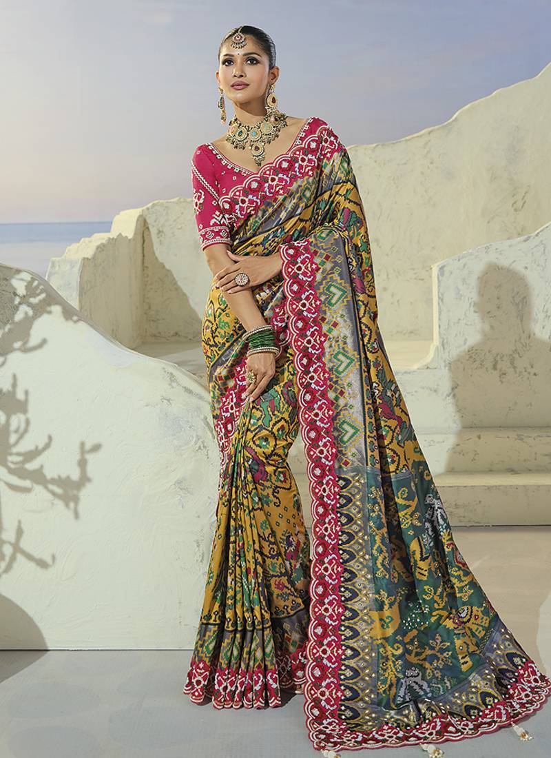 mustard pure patan patola silk blend saree with heavy cream moti & beads handwork