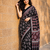 Black ajrakh print with mirror and latkan japan satin saree
