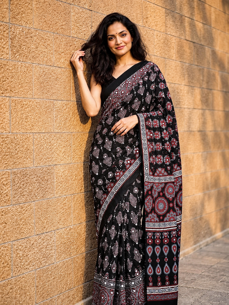 Black ajrakh print with mirror and latkan japan satin saree