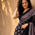 Black ajrakh print with mirror and latkan japan satin saree