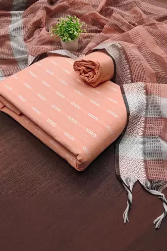 women peach woven design geometric dress material