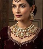 Stunning maroon color kundan necklace set for ethnic occasions