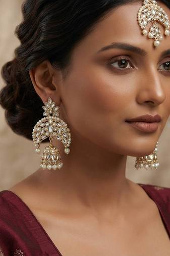 White color kundan earrings tikka set
