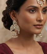 White color kundan earrings tikka set
