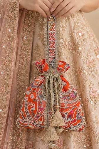 Orange gold silk potli bag