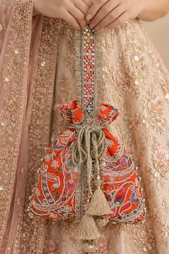 Orange gold silk potli bag