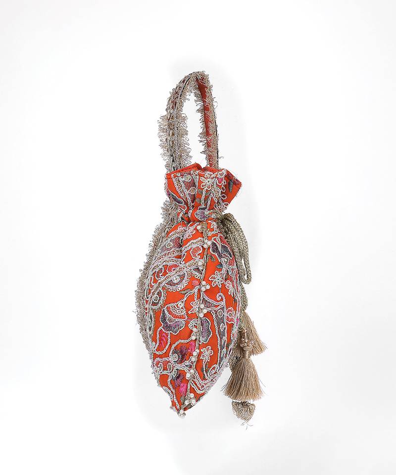 Orange gold silk potli bag