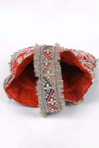 Orange gold silk potli bag