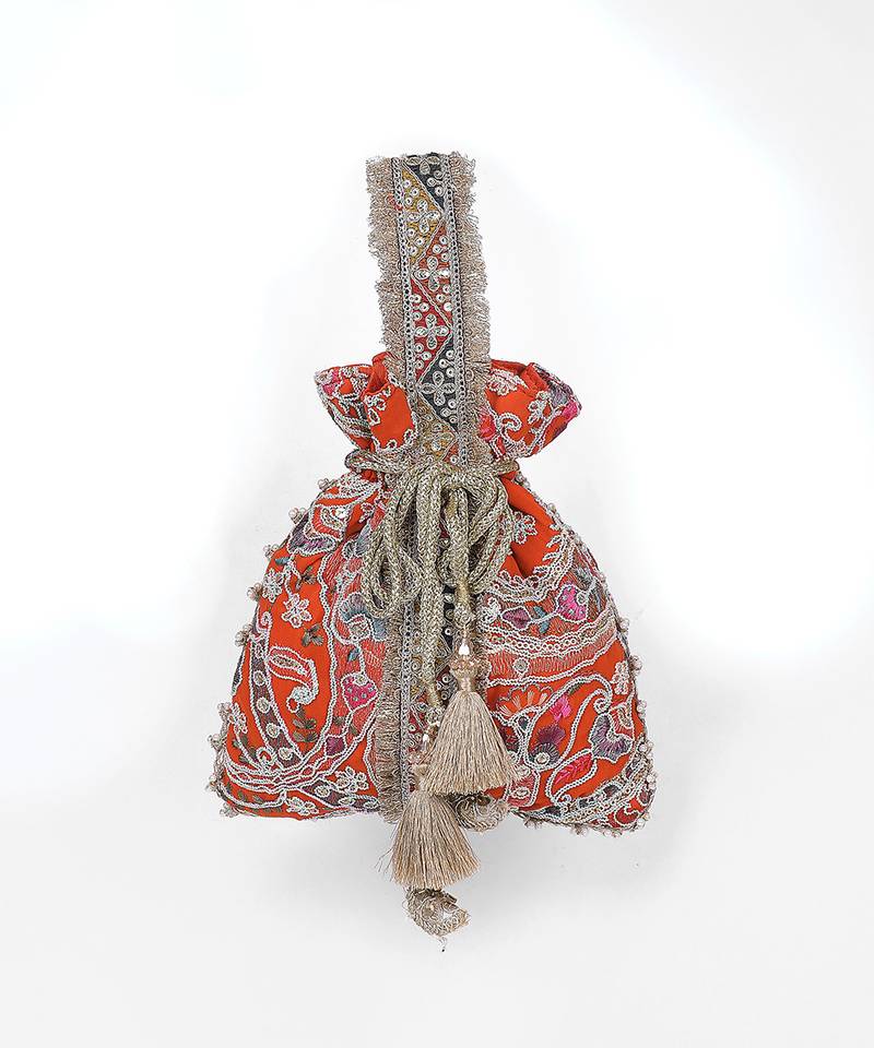 Orange gold silk potli bag