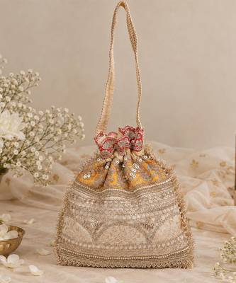 Mustard gold silk potli bag 1